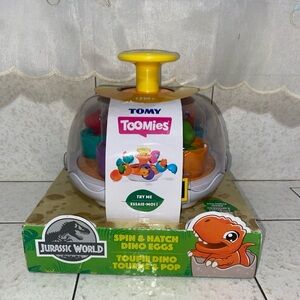 Tomy toomies spin and hatch Jurassic park Dino eggs NWT